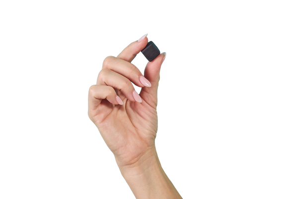 More/Less Protein Gummies in hand